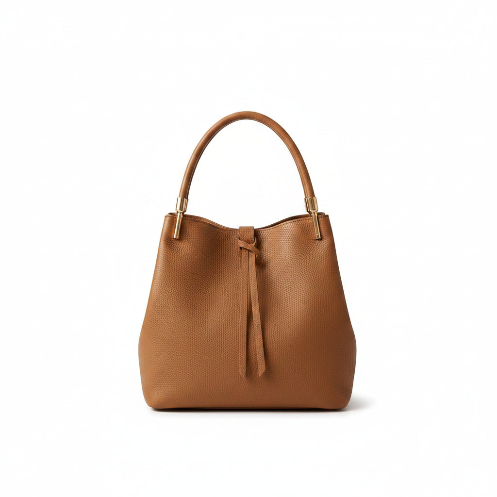 A tan leather hobo-style handbag shown from multiple angles on a white background, including a close-up of the pebbled texture and gold-tone handle hardware.