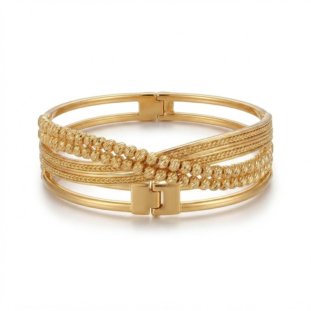 A gold multi-band bangle bracelet featuring a combination of smooth banded rings, twisted rope textures, and braided details, shown on a clean white background.